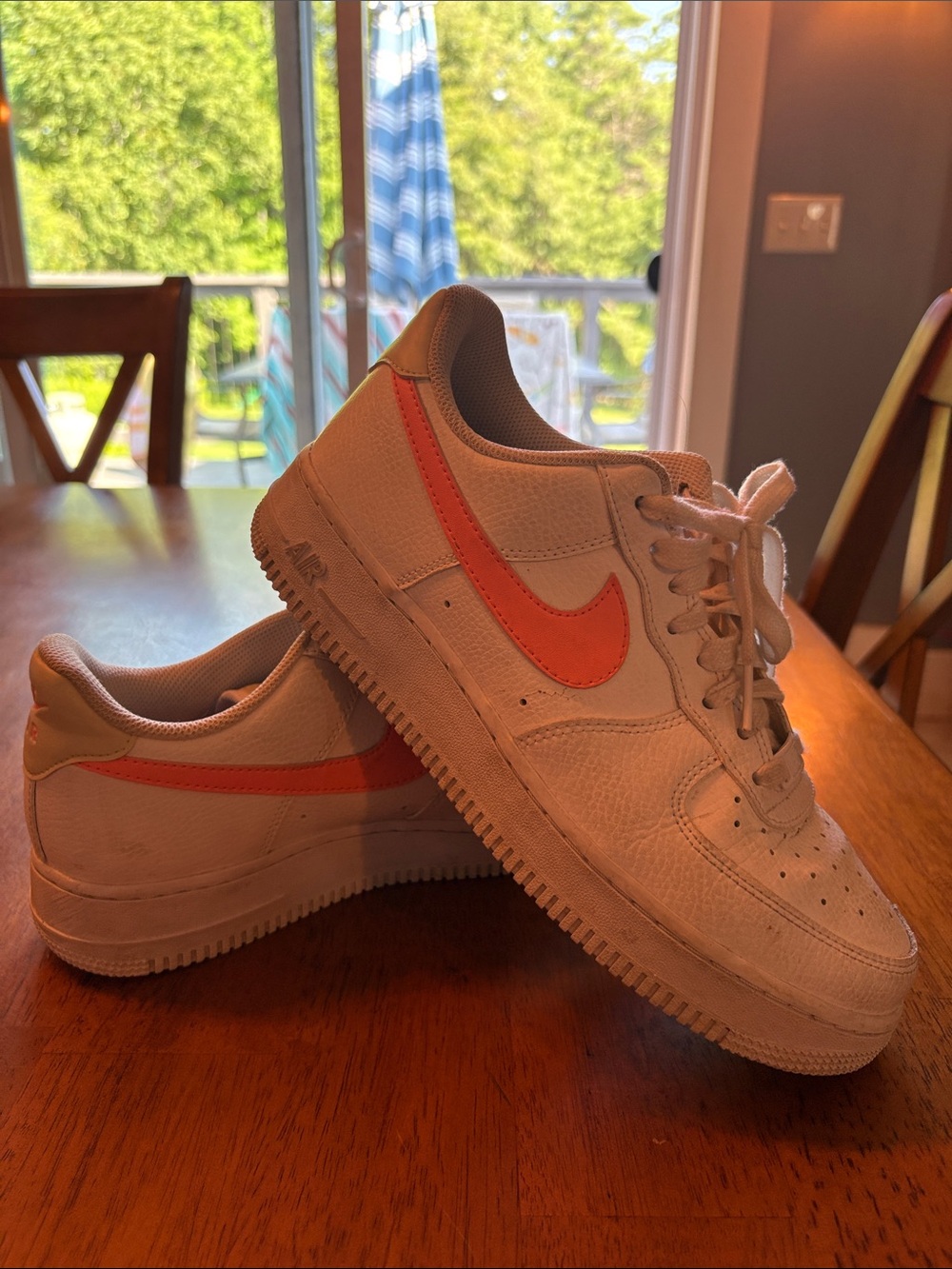 Nike White Low-Top Sneakers with Coral Swoosh